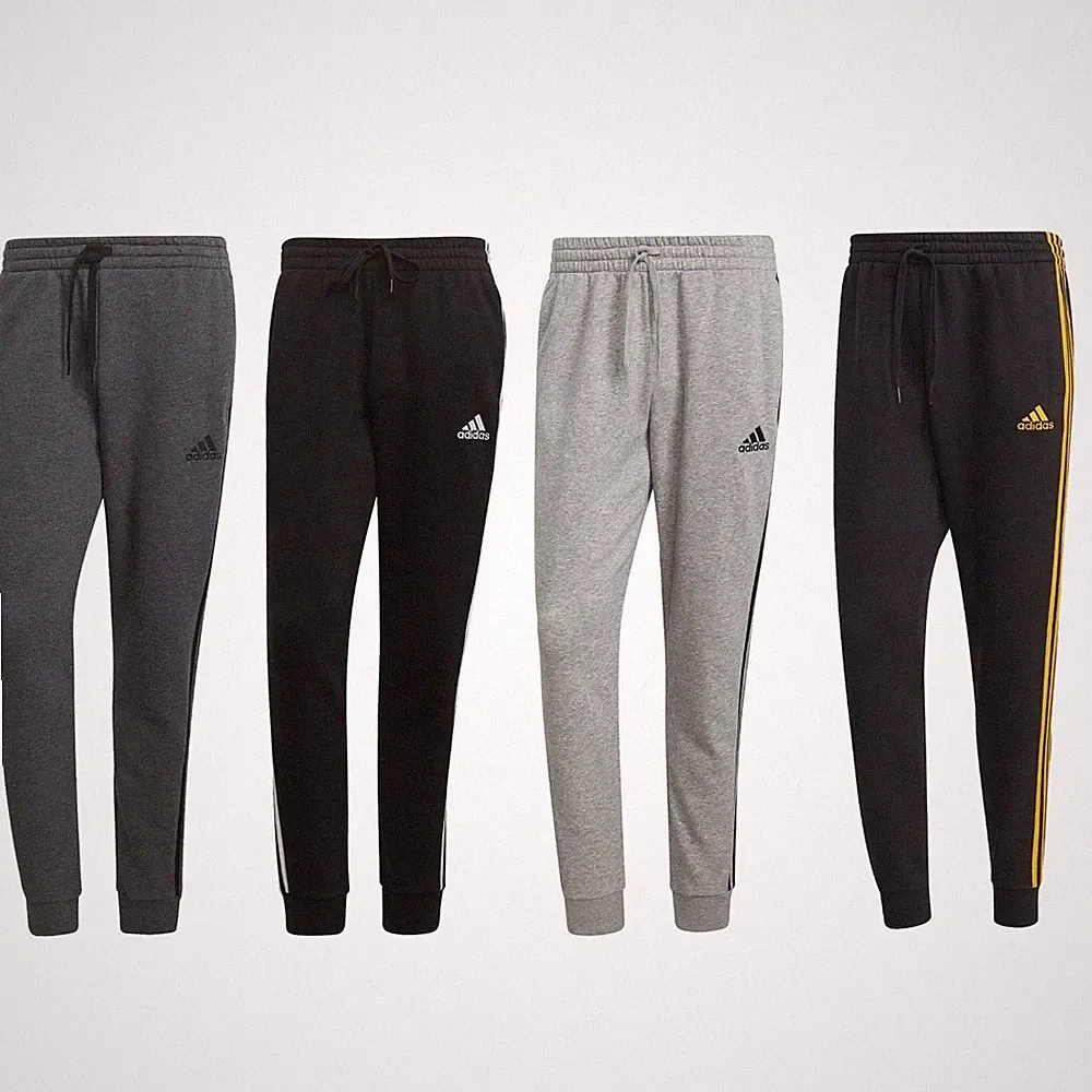 adidas Jogginghose Trainigshose Herren im 3 Streifen Design mit Fleece innen