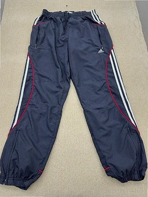 Adidas Trainingshose dunkelblau 3-Streifen Tapered Reißverschlusstaschen Unisex