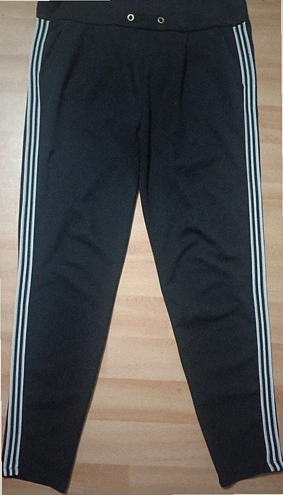 Amisu Glitzer Jogginghose Gr. L schwarz-weiß-silber