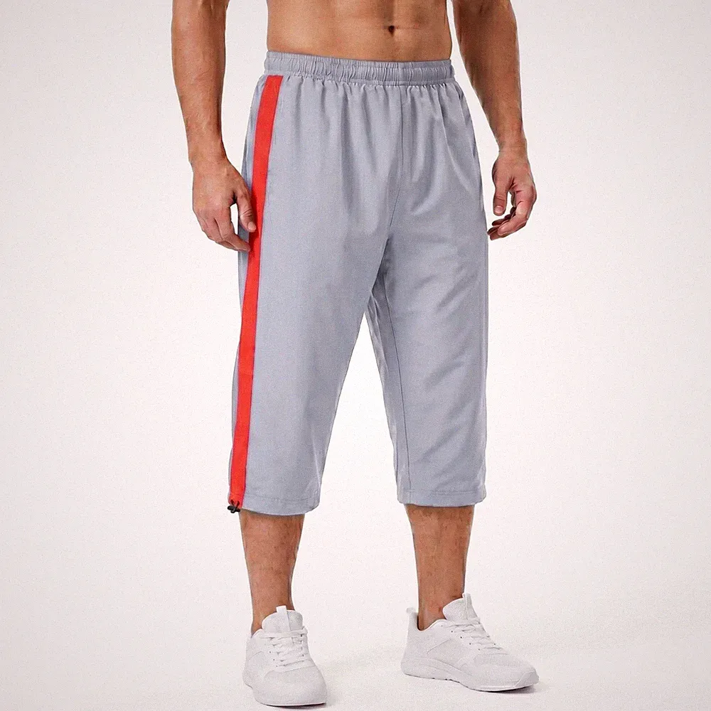 Herren 3/4 Jogginghose Netz gefüttert Fitnessstudio Jogginghose ein Streifen Sporthose