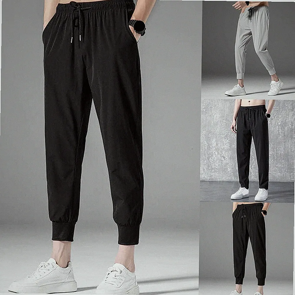 Herren Cropped Jogginghose schwarz und grau dünn Polyester lose Bündchen Hose