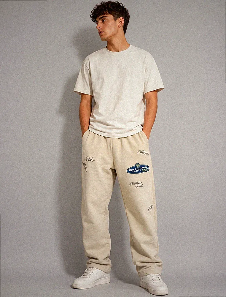 Herren Jogginghose Beige Gr. M gerades Bein elastischer Bund Logo bestickt