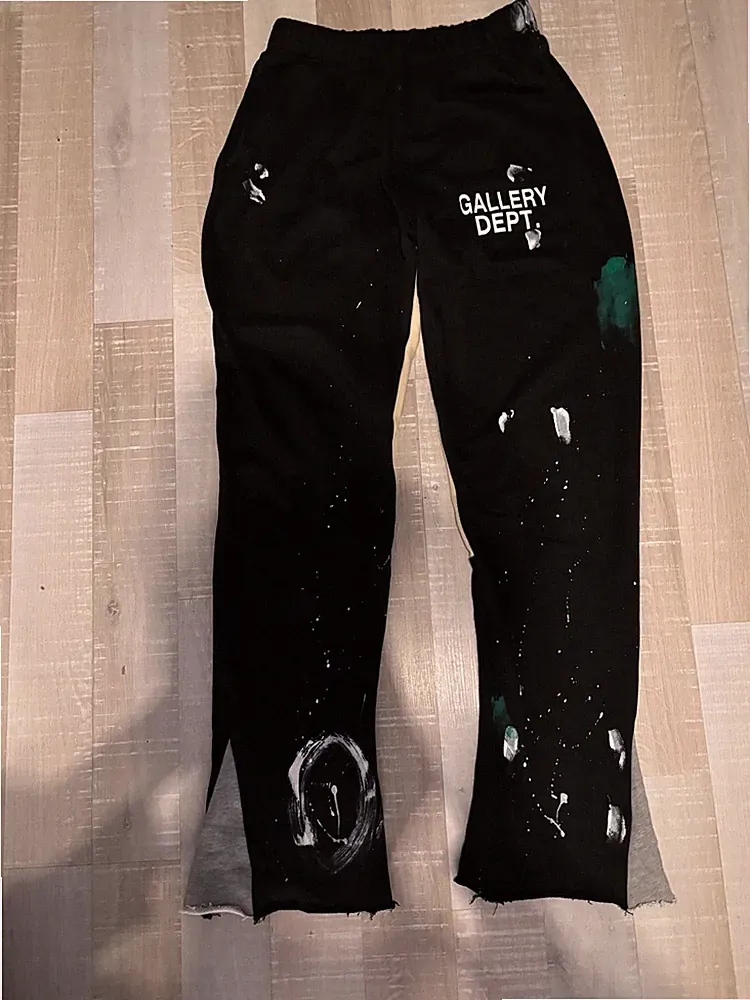 Herren Jogginghose L Baumwolle schwarz Logo Farbkleckse elastischer Bund