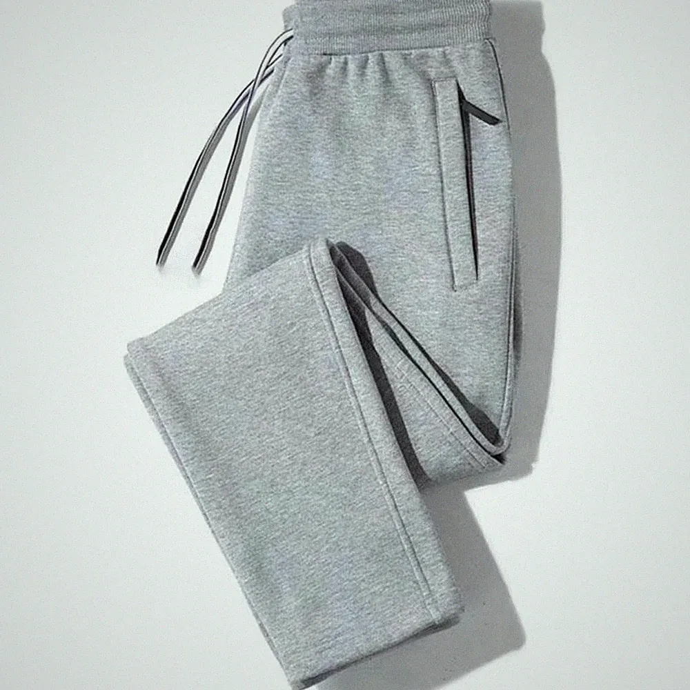 Herren Loose Fit Jogginghose mit Gummibund Kordelzug und Reißverschlusstaschen
