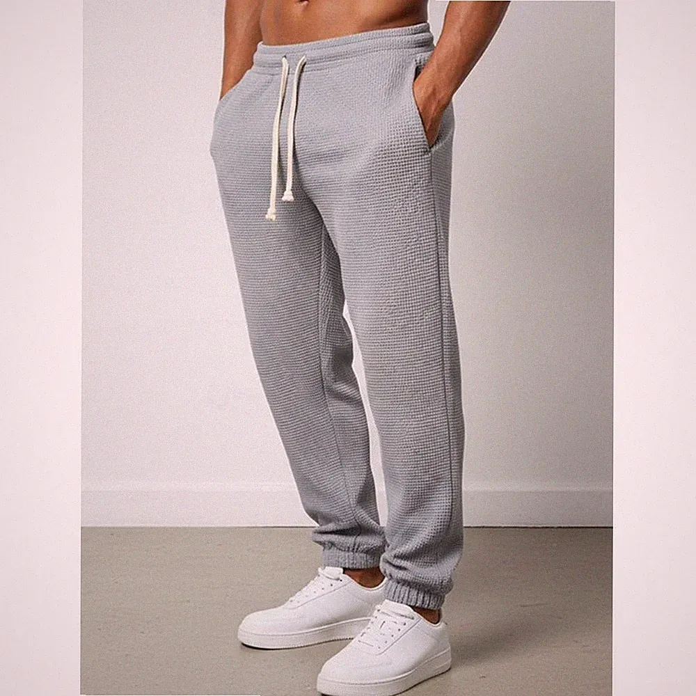 Herren Polyester Jogginghose Einfarbig Elastischer Bund Tapered Leg Design