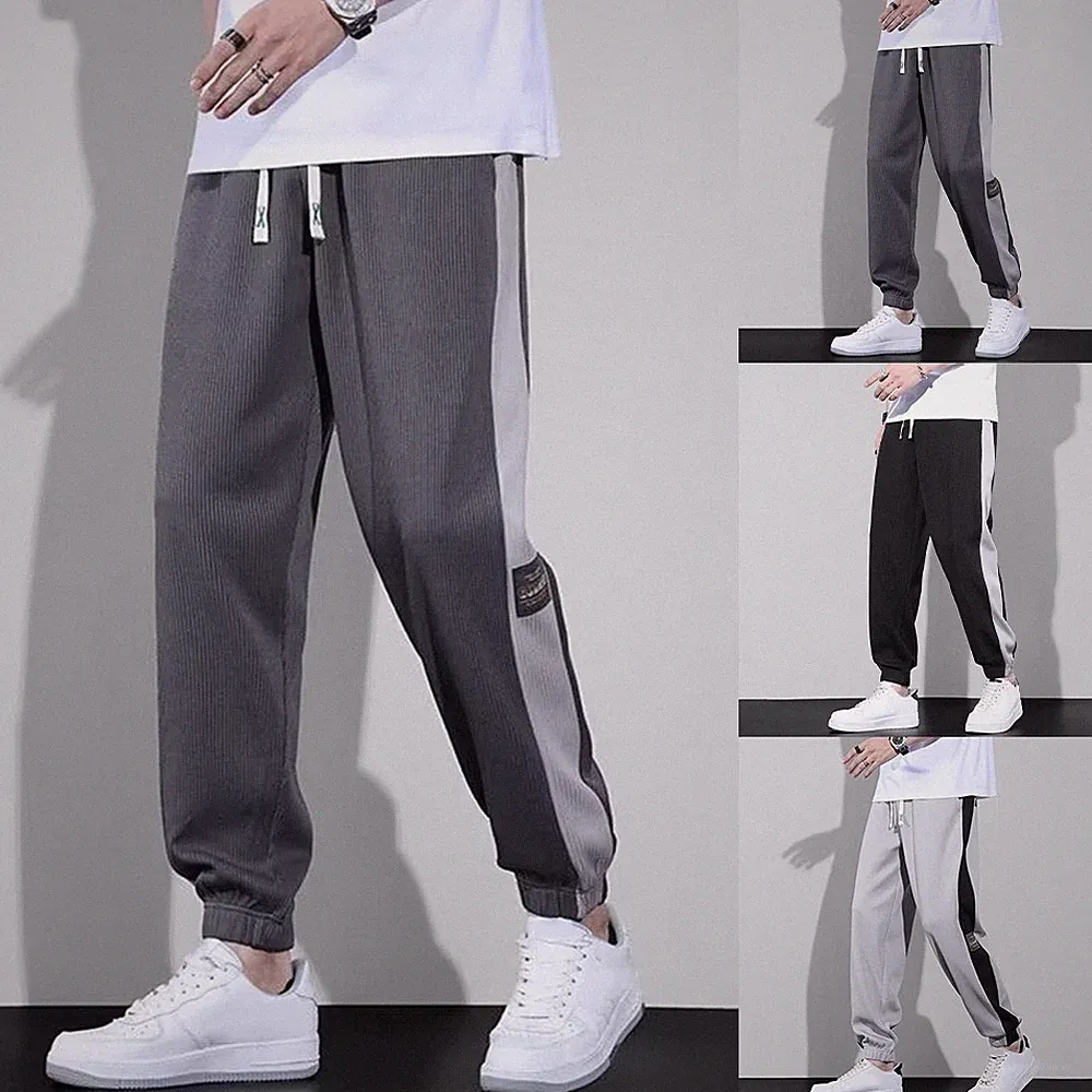 Herren Slim Fit Jogginghose mit Kontrastnähten Patchwork und Bündchen am Saum
