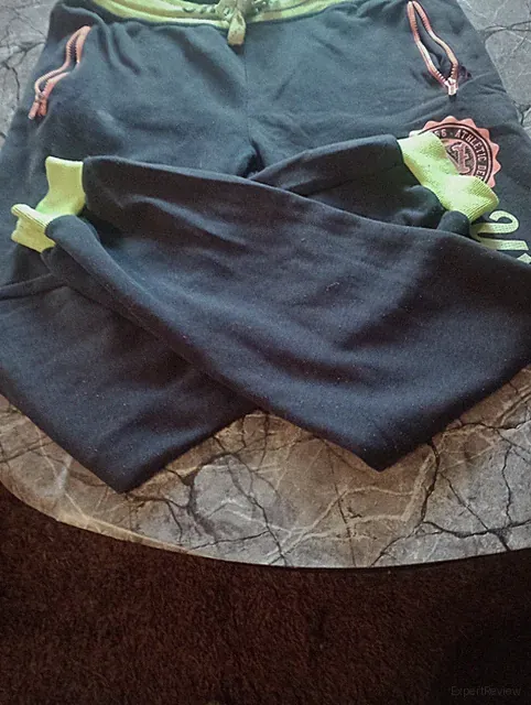 Herrenjogginghose, dunkelblau mit Orangenen Und Gelben Farbabhebungen, 10€