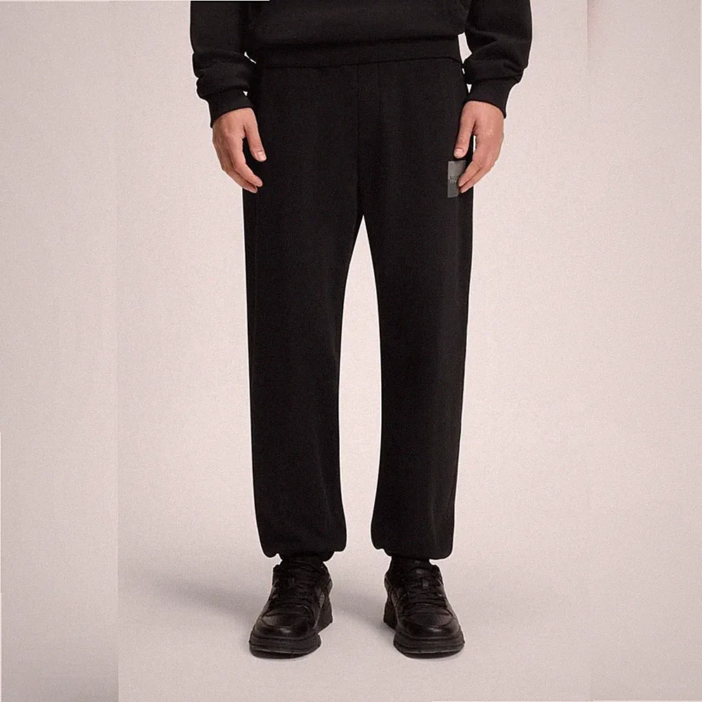 HUGO BOSS Jogginghose (EU: M) aus Baumwoll-Terry mit Split-Logo, Schwarz