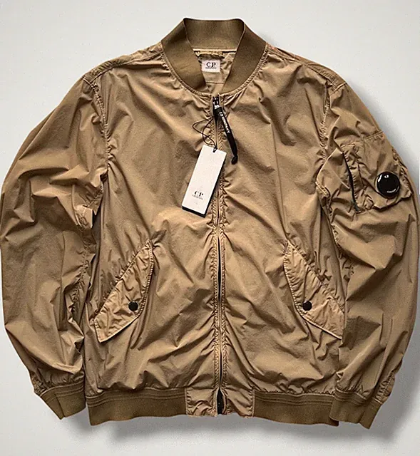 L - C.P. Company kurze leichte Jacke grün Nylon Bomber College Baseball