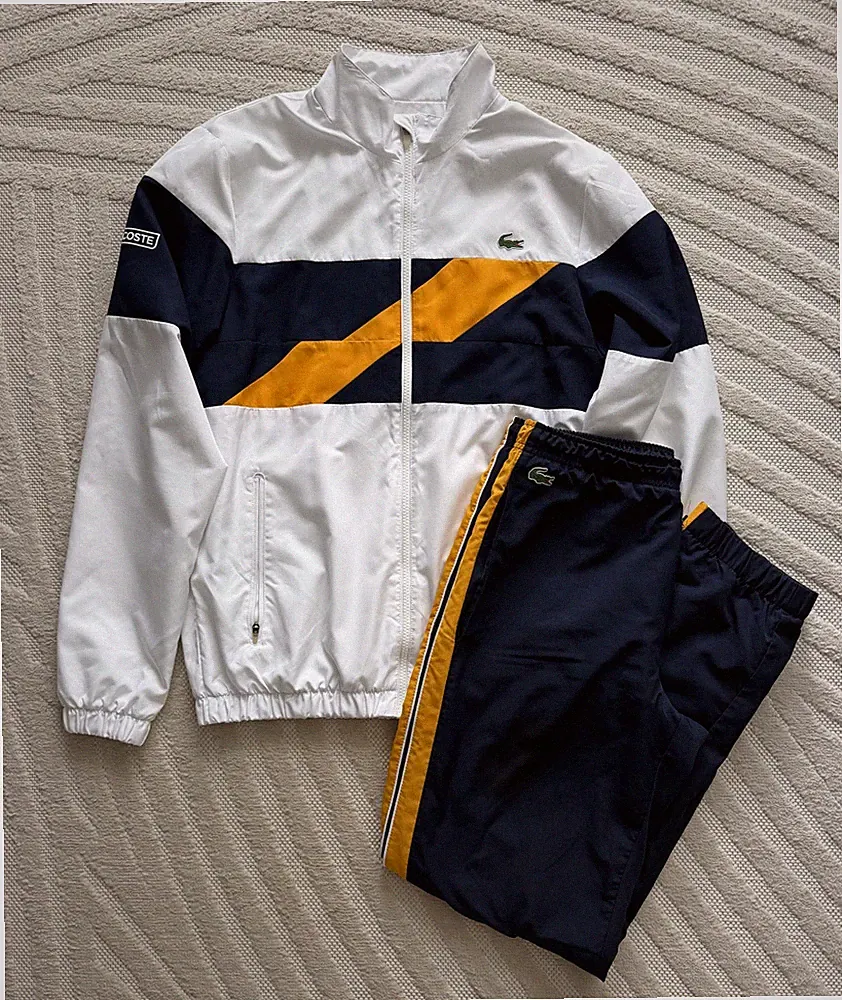 Lacoste Jogginganzug US M – Jacke & Hose – Weiß/Navy mit gelben Akzenten