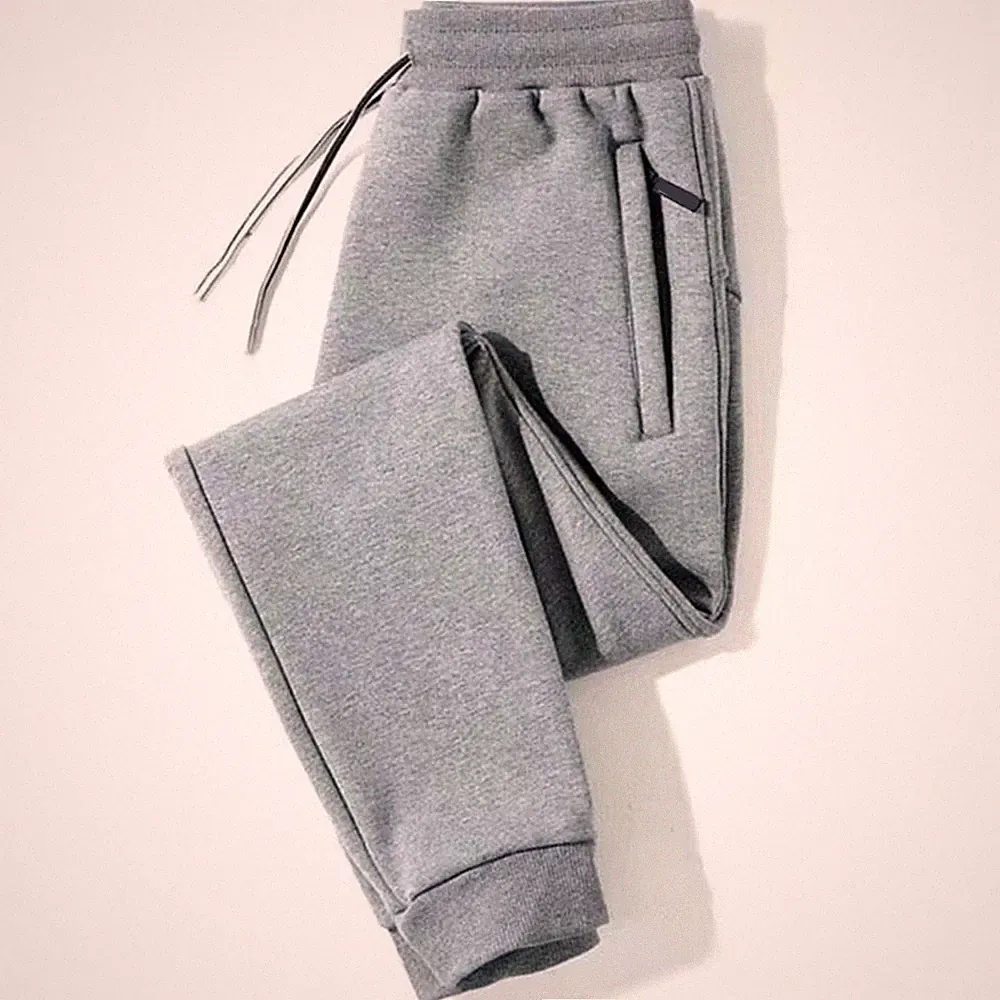 Lockere Herrenhose für Männer Gummibund Jogginghose mit Reißverschlusstaschen