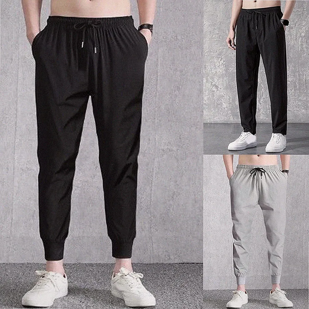 Loose Fit Cropped Jogginghose für Männer dünnes Polyestergewebe täglich Arbe