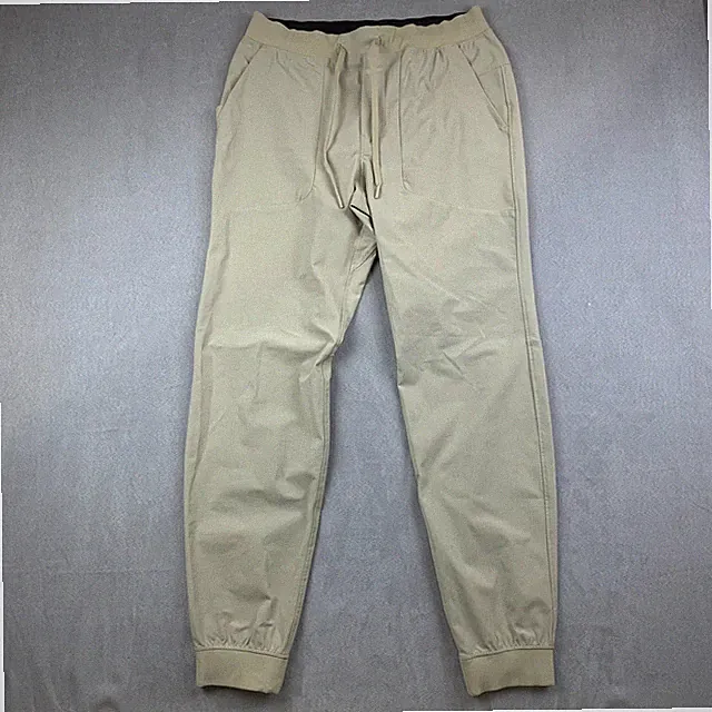 Lululemon Mens Pants Large Beige ABC Jogger Tall 32" Warpstreme Tapered M5A31T