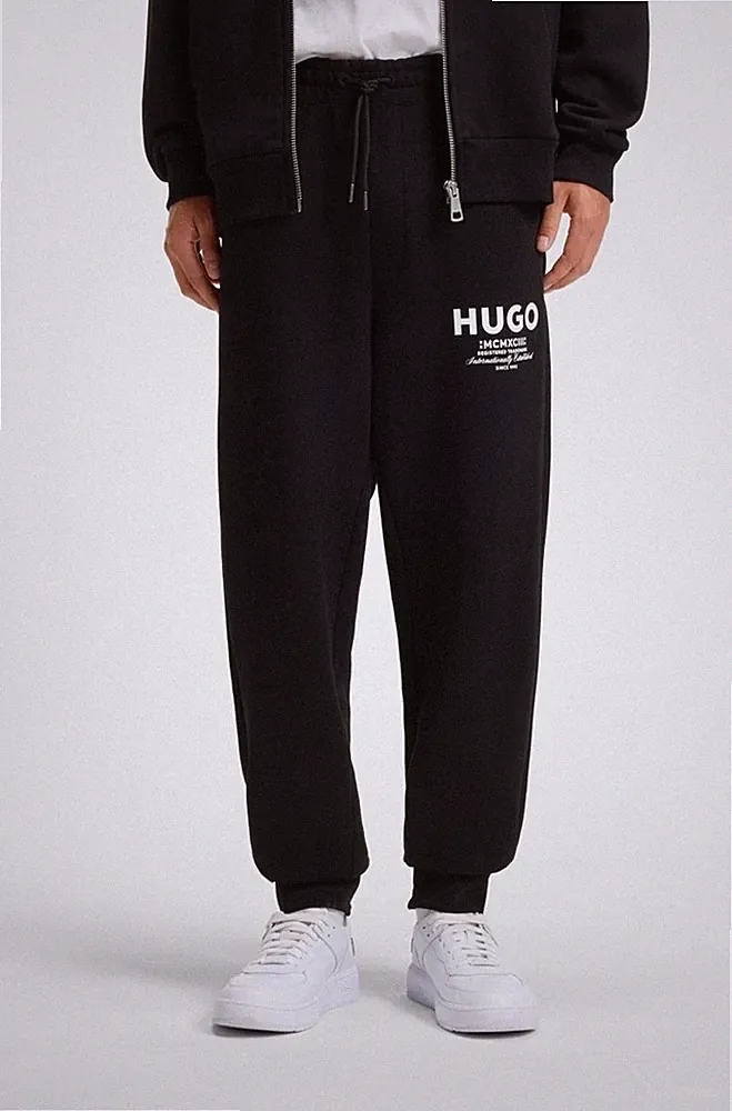 NEU❗️ HUGO Jogginghose NEVEZ-Baumwolle-black-Oversize-50510734-Gr. M-UVP:109,95€