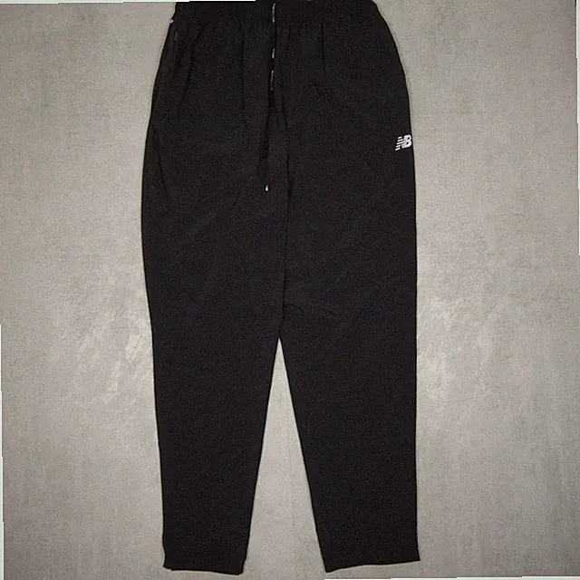 New Balance Woven Trainingshose Herren L Schwarz Regular Fit Tapered Sportswear