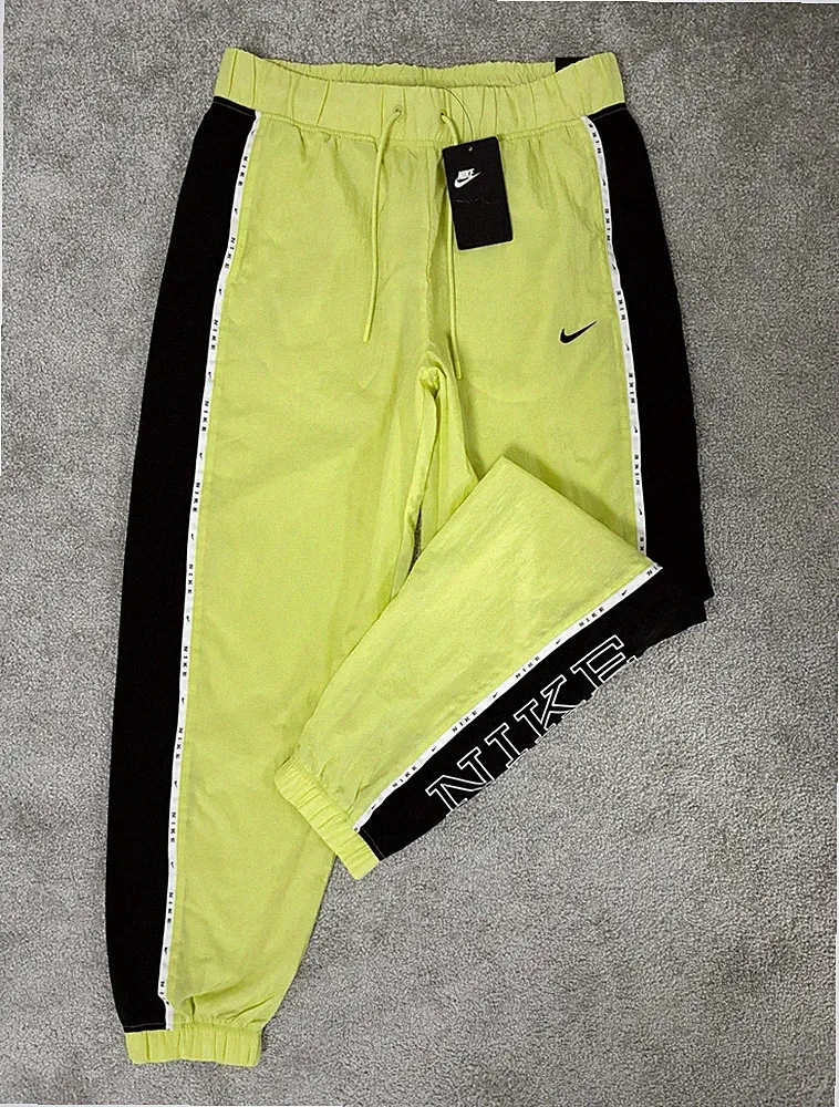 Nike Damen Jogginghose Standard Fit Gelb/Schwarz Gr. M mit Taschen, Mesh