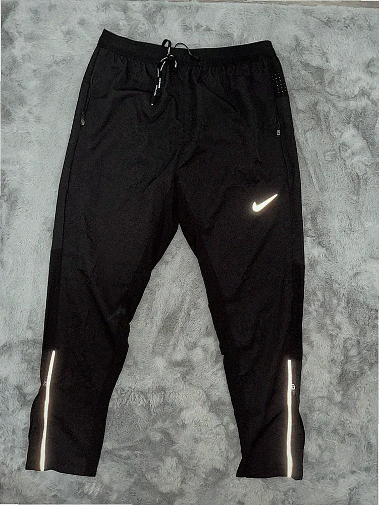Nike Dri-FIT ADV Herren Laufhose M Schwarz Reflektor Kordelzug Logo