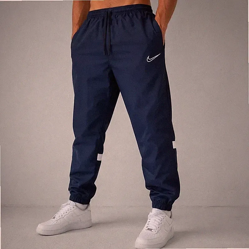 Nike Herren Dri-FIT Trainingshose Blau Gr. L Regular Fit Sport Jogginghose