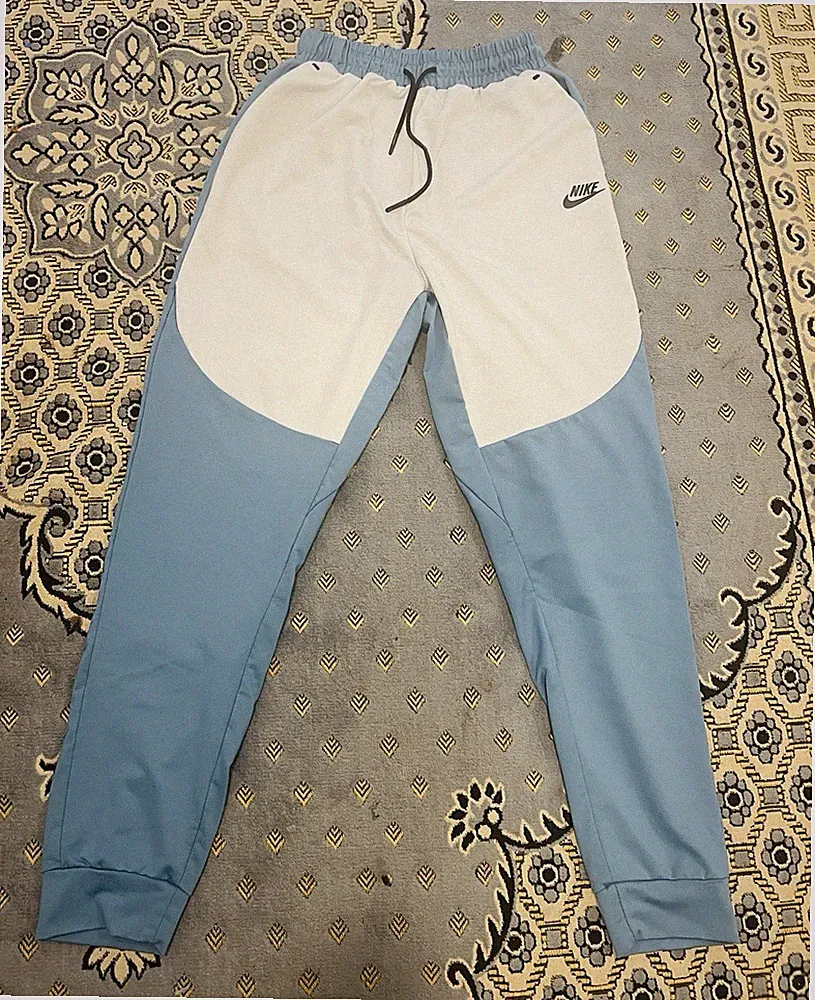 Nike Herren Jogginghose Gr. S Weiß/Blau, elastischer Bund, Kordelzug, Logo