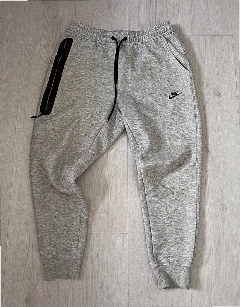 Nike Herren Jogginghose L Grau/Schwarz Baumwoll-Fleece Logo Tapered Taschen