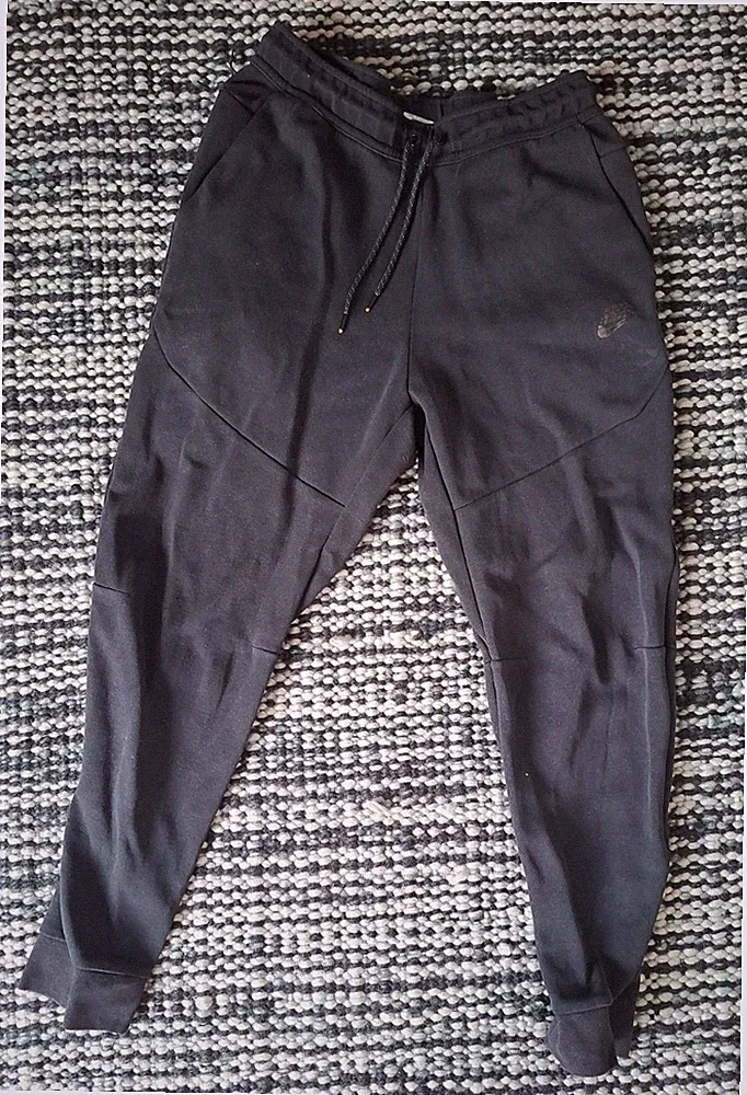 Nike Herren Jogginghose M Schwarz tapered mit Zugband & Taschen