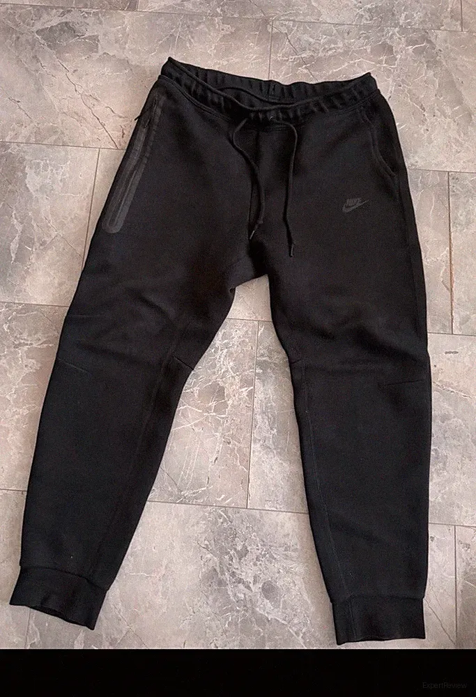 Nike Herren Jogginghose Schwarz M Polyester Tapered mit Reißverschlusstasche
