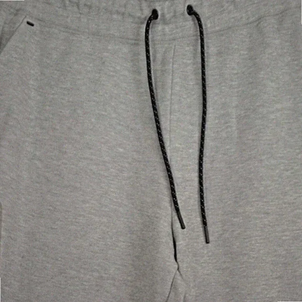 Nike Herren Jogginghose Trainingshose Grau Meliert Gr. 50 L Reißverschlusstasche