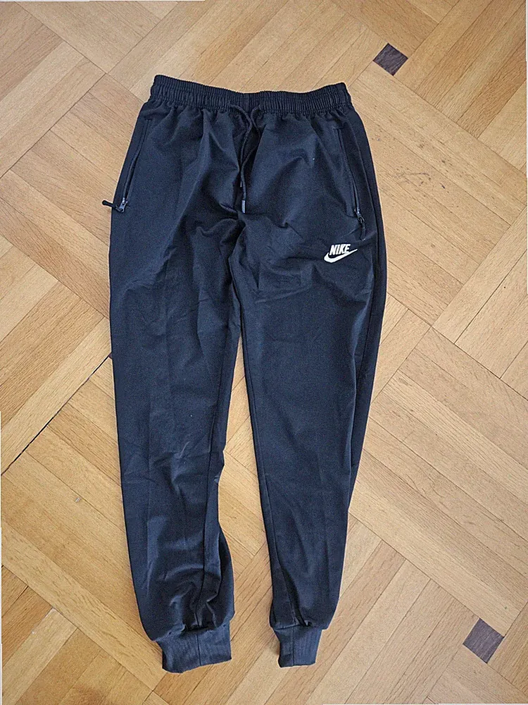 Nike Herren Jogginghose Trainingshose Schwarz Größe XL Reißverschlusstaschen