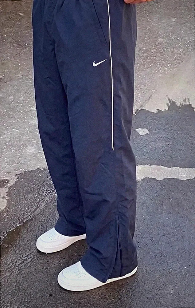 Nike Herren Trainingshose Blau Gr. S gerades Bein Taschen Reißverschluss Saum
