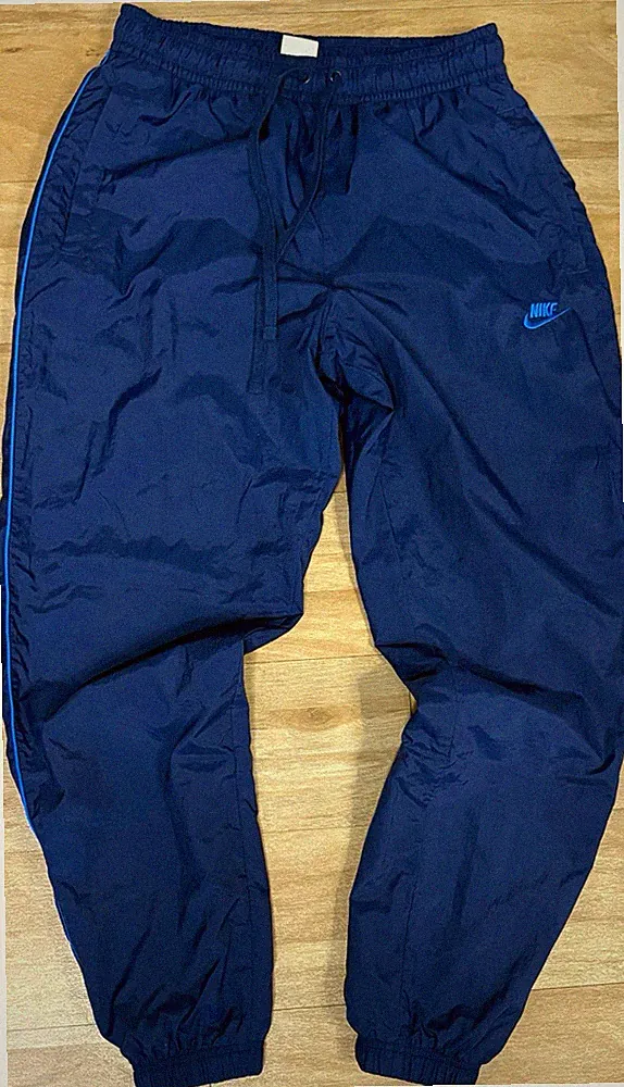 Nike Herren Trainingshose Jogginghose blau/navy Logo Taschen elast. Bund Gr. M