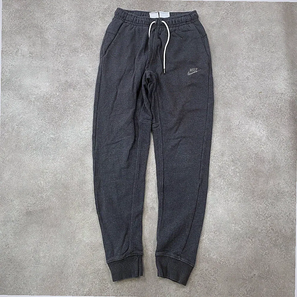 Nike Jogginghose Damen XS Sportswear Washed Fleece Logo Trainingshose, Grau