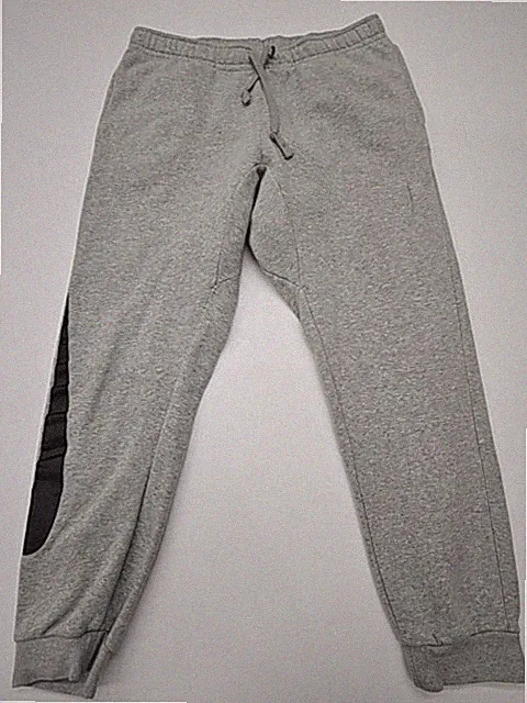 Nike Jungen grau Fleece Jogginghose Gr. M Locker Kordelzug Taschen