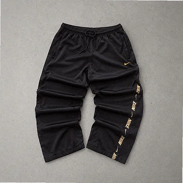Nike Pants Schwarz, Gold Limited M