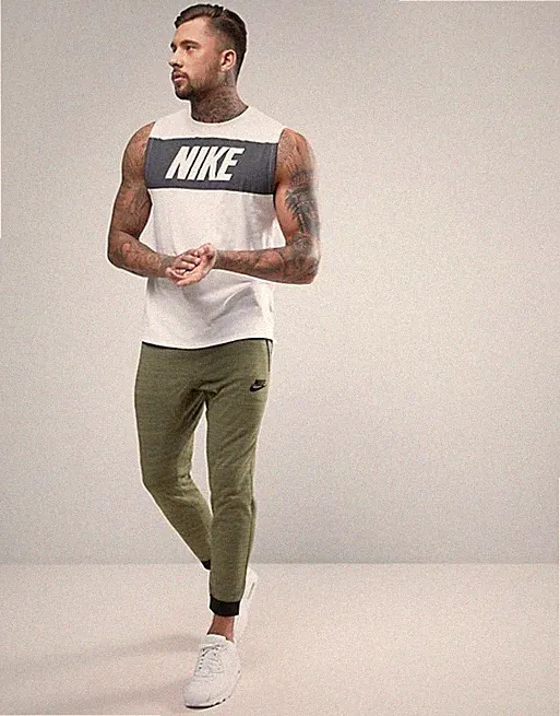 NIKE SPORTSWEAR ADVANCE 15 HERREN STRICK JOGGINGHOSE HOSE PALMENGRÜN