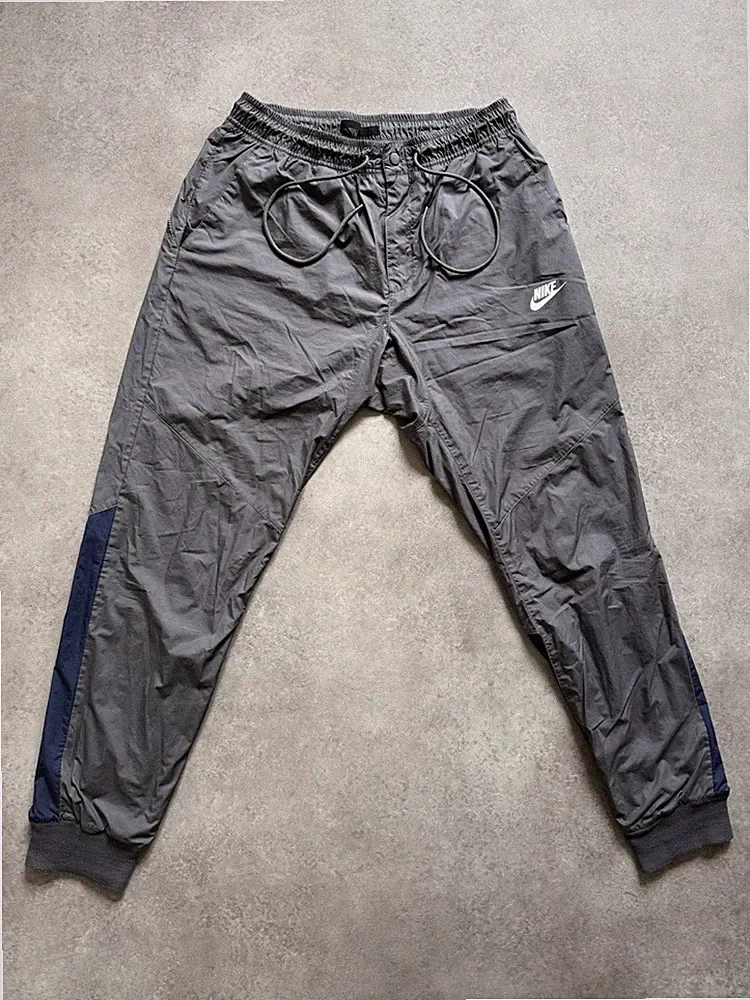 Nike Sportswear Herren Trainingshose Woven Jogginghose Grau Anthrazit Gr. M Mesh