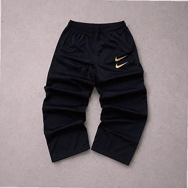 Nike Track Pants Schwarz, Gold Limited M