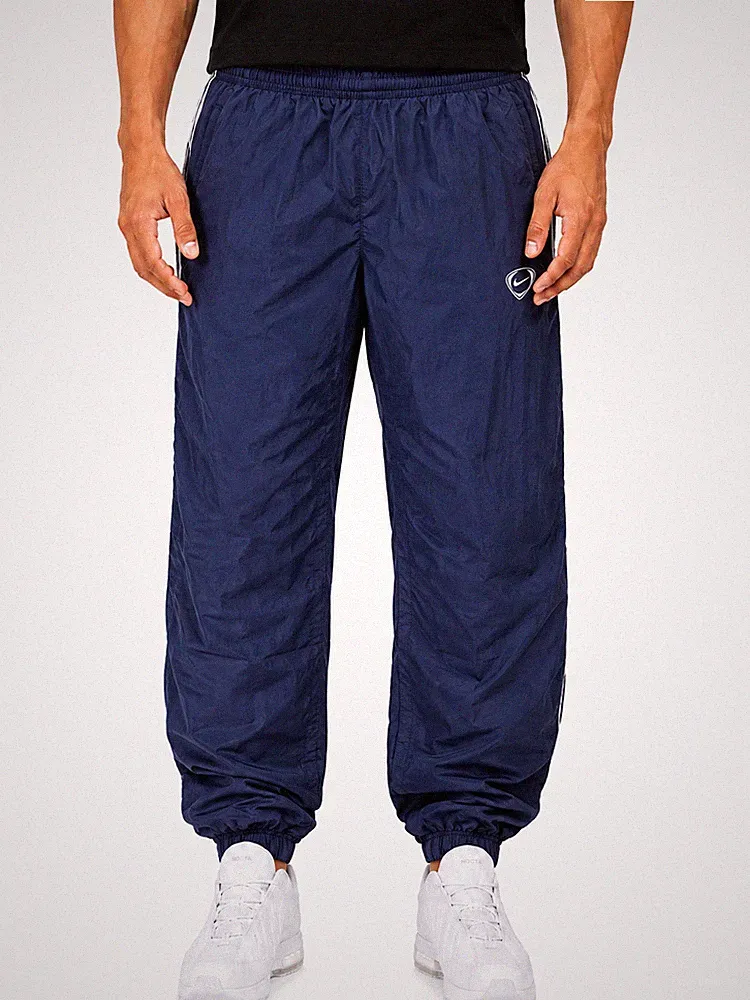 Nike Trackpants vintage baggy Jogger Herren Jogginghose dunkelblau/weiß Größe L