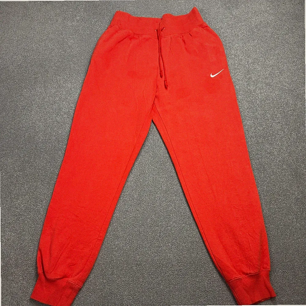 Nike Trainingshose Erwachsene Medium orange Swoosh Y2K Fleece Sport Baggy Jogginghose Herren