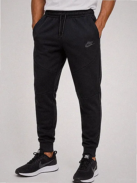 Nike Unisex Jogginghose Schwarz Fleece Größe M Relaxed Fit Taschen