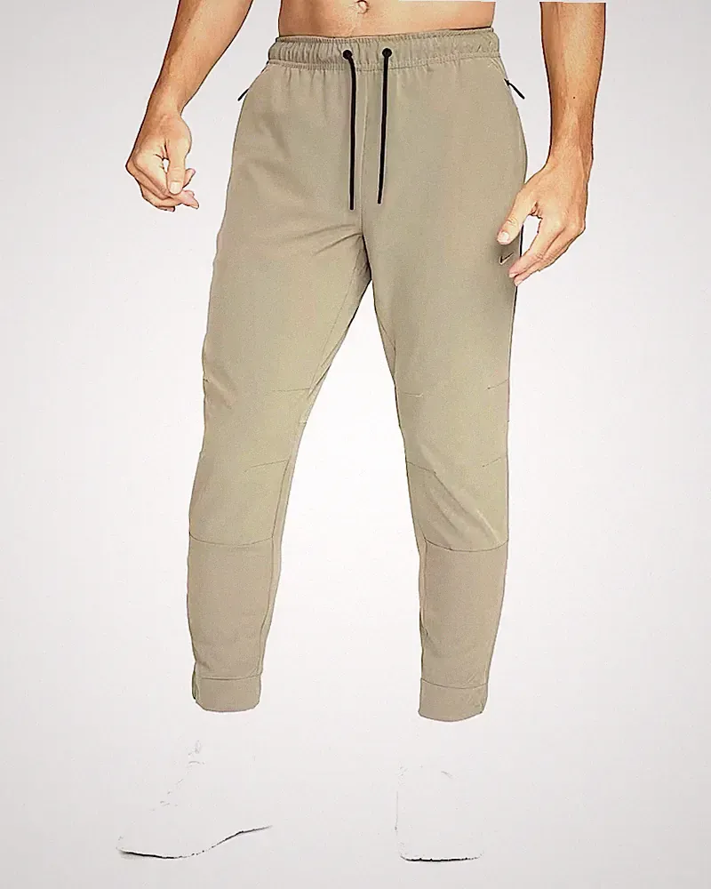 Nike Woven - STRETCH - ZIP TASCHEN - ZIP CUFF - UVP 69,99£ Yoga Herren Hose