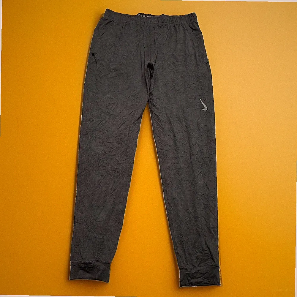 Nike Yoga Herren Trainingshose Jogginghose Sporthose Laufhose Gr. M #FF1-2