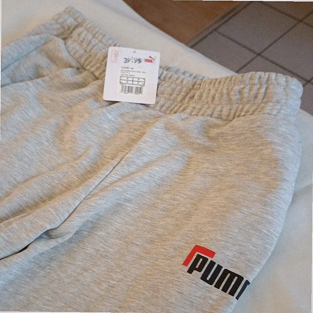 PUMA Herren Jogginghose grau Gr. M, elastischer Bund, Training & Freizeit