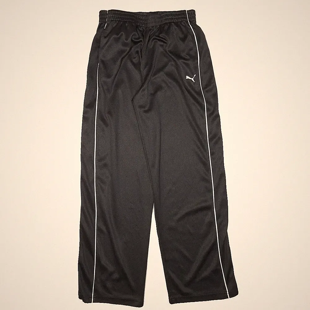 PUMA Herren Jogginghose Schwarz-Weiß Regular Tapered Größe M W24 L27