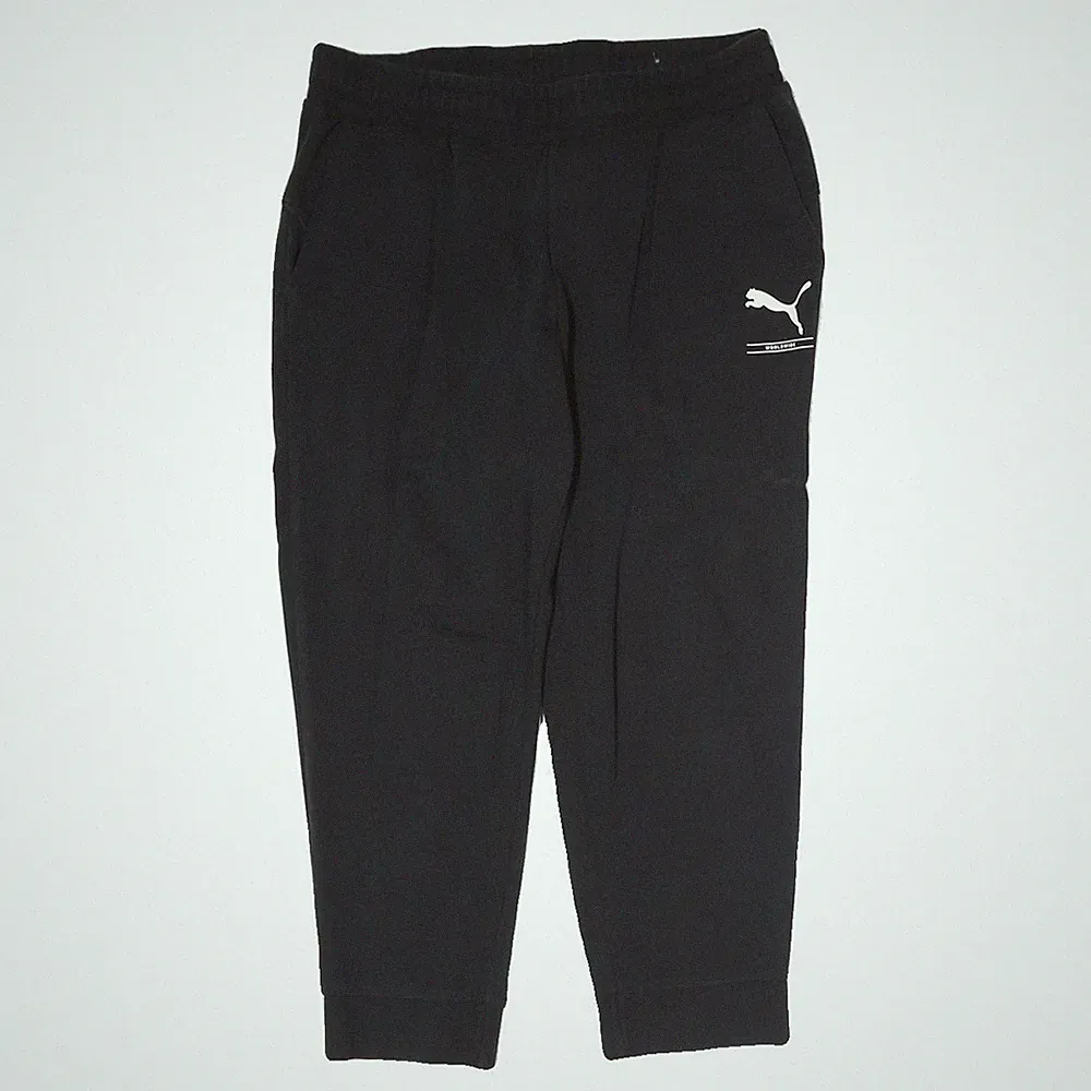 PUMA Herren Jogginghosen Schwarz L W30 L25 Slim Tapered Logo Druck Taschen
