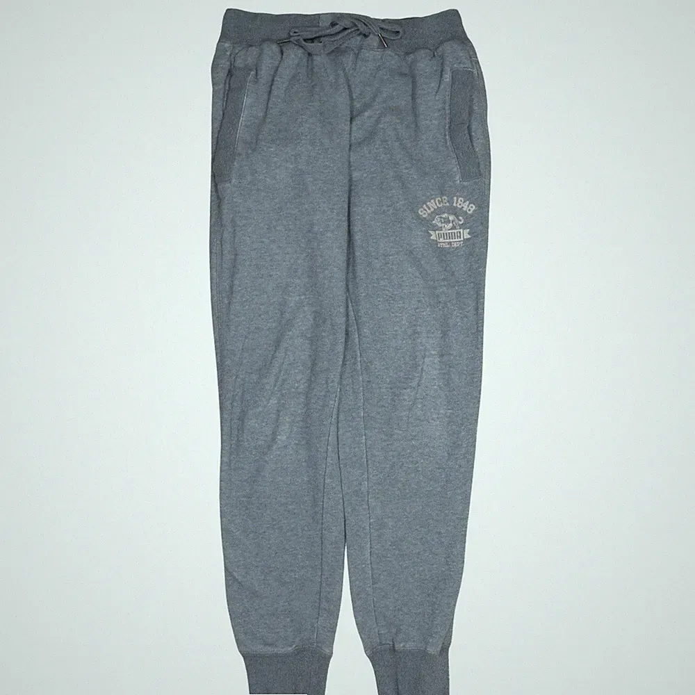 Puma Jogginghose Herren grau S Gummibund Logo Tapered Leg