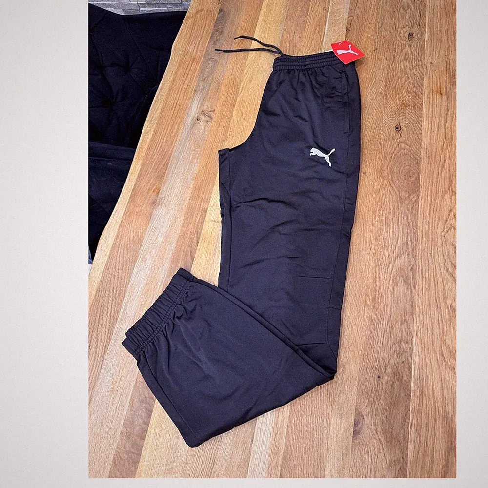 PUMA Tricot Pant Jogginghose Herren Schwarz M mit Reißverschlusstaschen