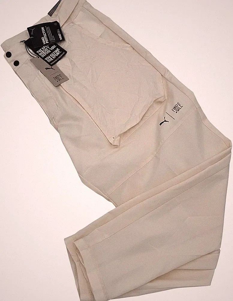 PUMA x First Mile Train FM Woven Pant Hose Jogginghose Trainingshose beige 2XL