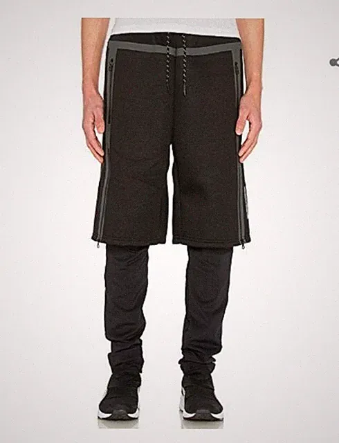 PUMA X UEG SWEATSHORTS 2-1 TIGHTS SIZE UK L NWT