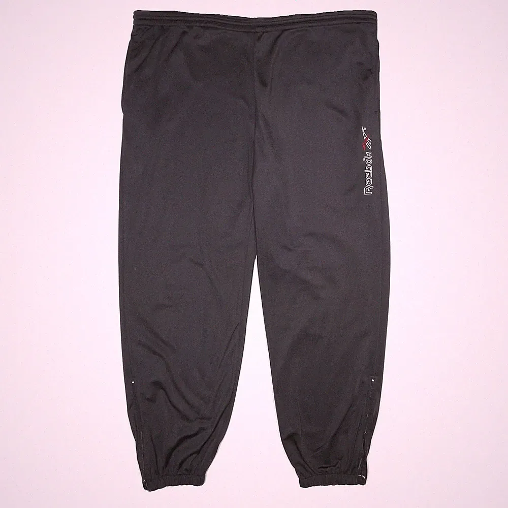 REEBOK Herren Jogginghosen Schwarz XL Polyester Slim Tapered W44 L32 Kordelzug
