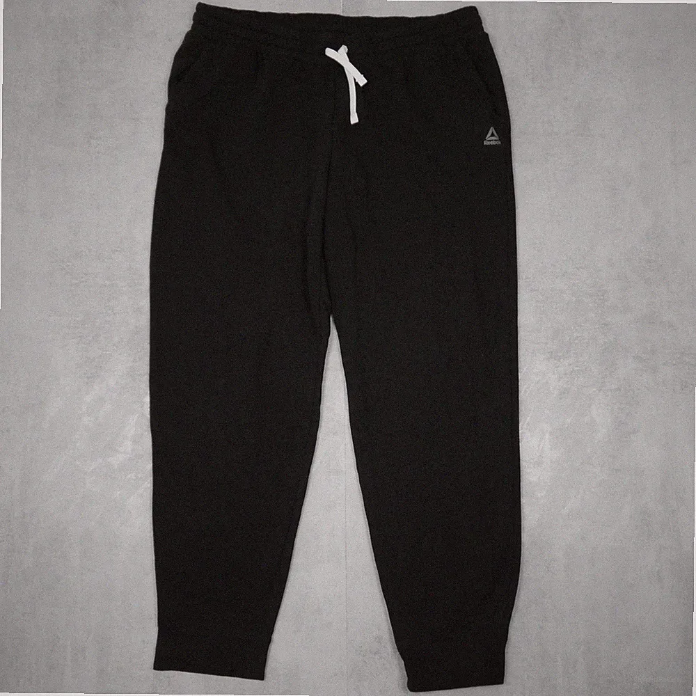 Reebok Jogginghose Damen XL Schwarz Small Logo Tapered Fit Sportwear